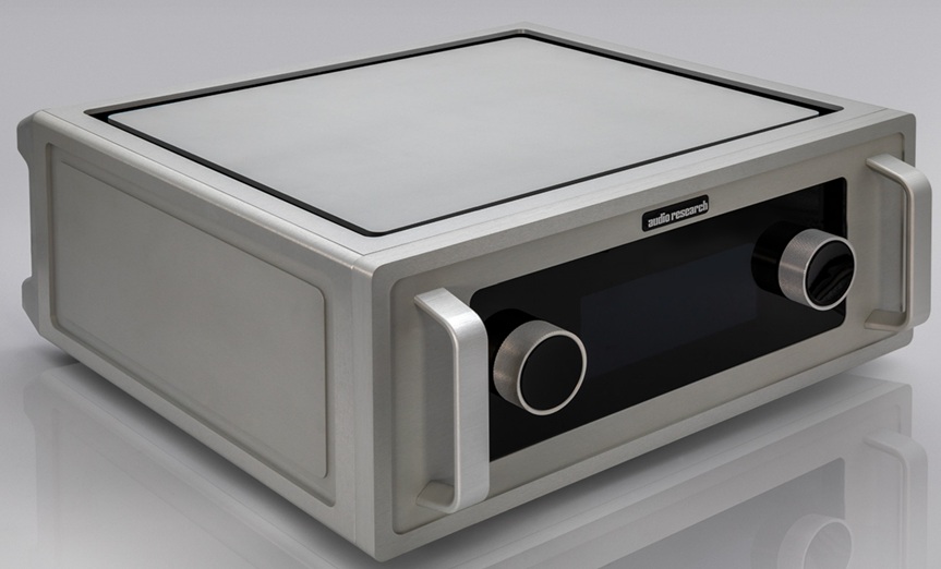 High-end audio amplifier with two large knobs on the front panel and metal handles, branded 'Audio Research'.