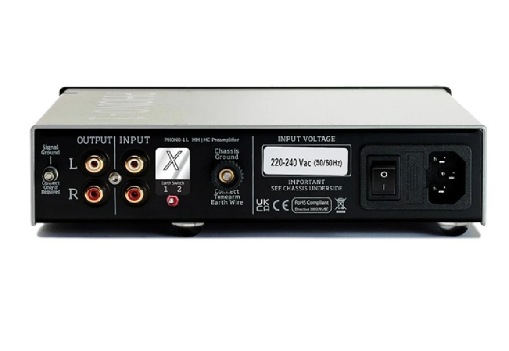 Rear panel of audio amplifier showing L/R outputs, RCA inputs, ground and switch, with AC power plug and on/off switch